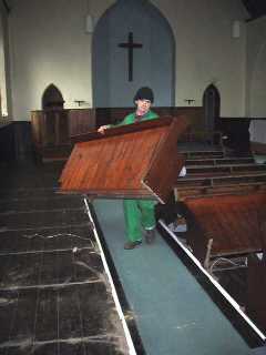 Removing the pews from the Church